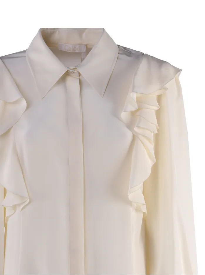 Blusa con maniche a palloncino