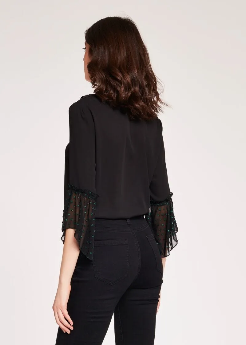 Blusa con rouche in plumetis