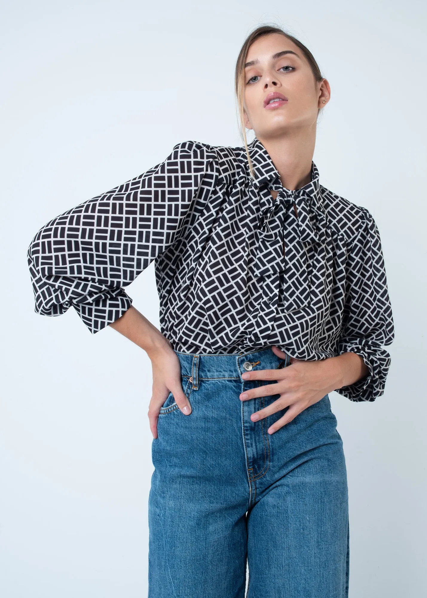 Blusa con stampa geometrica